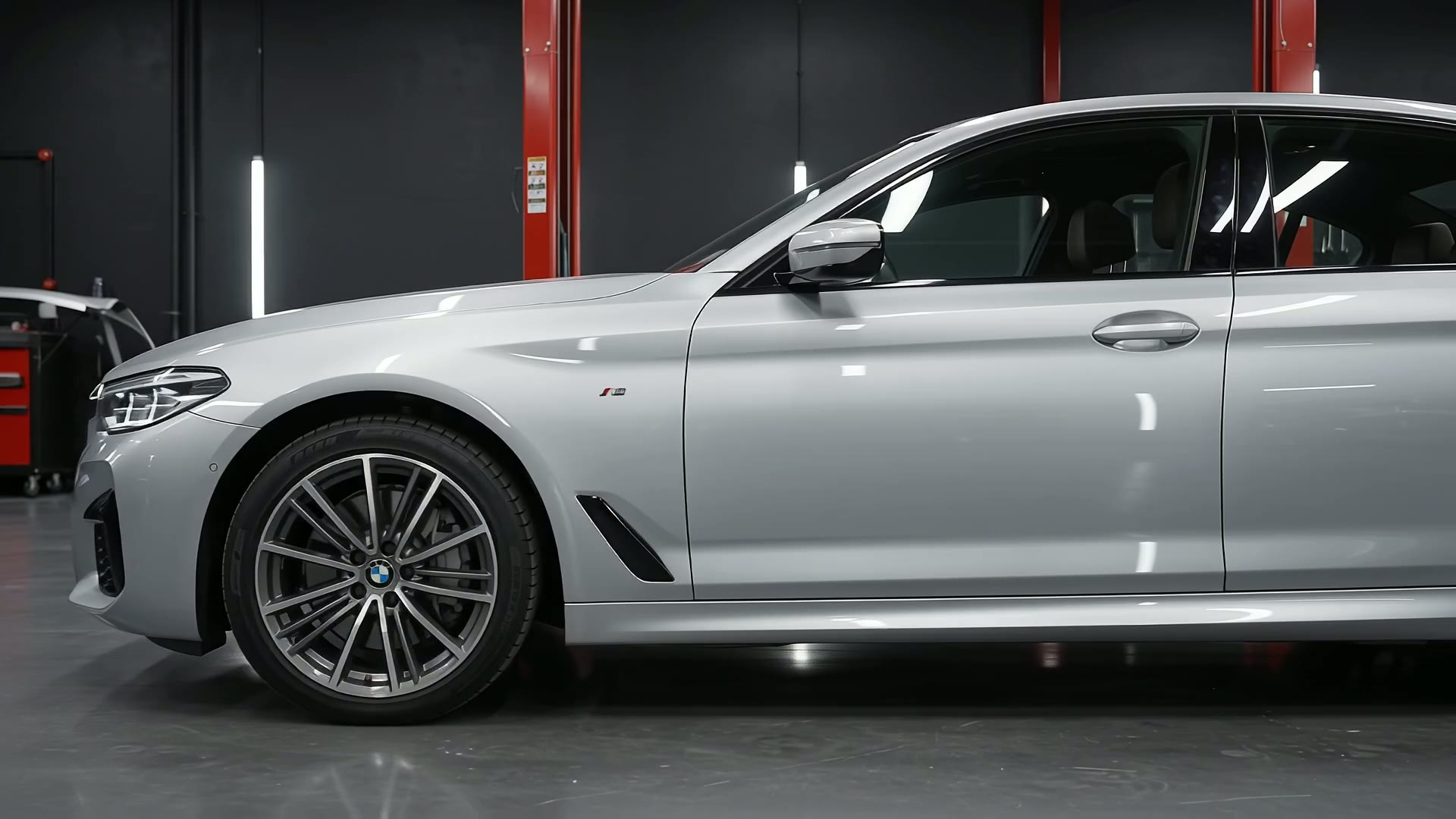 Illustrative silver car showing a polished body finish